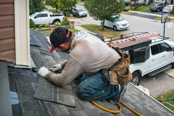 Professional Roofing technician working in Churchville, MD